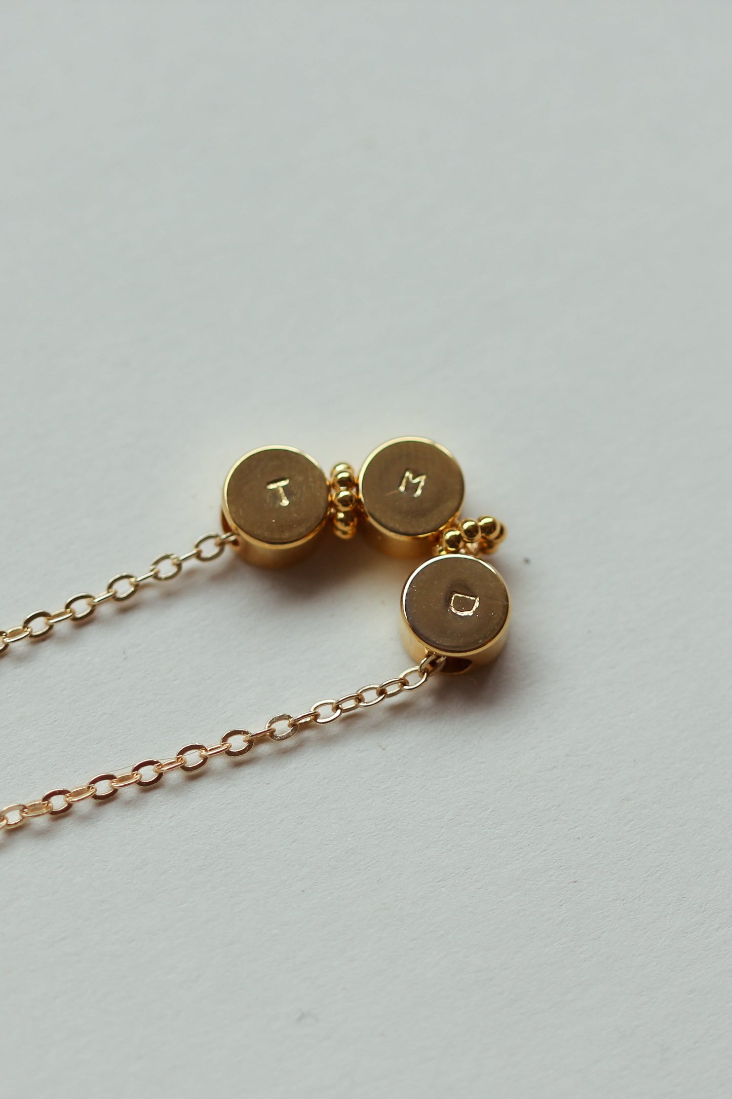 Round pendant initial necklace. Sterling silver and gold vermeil