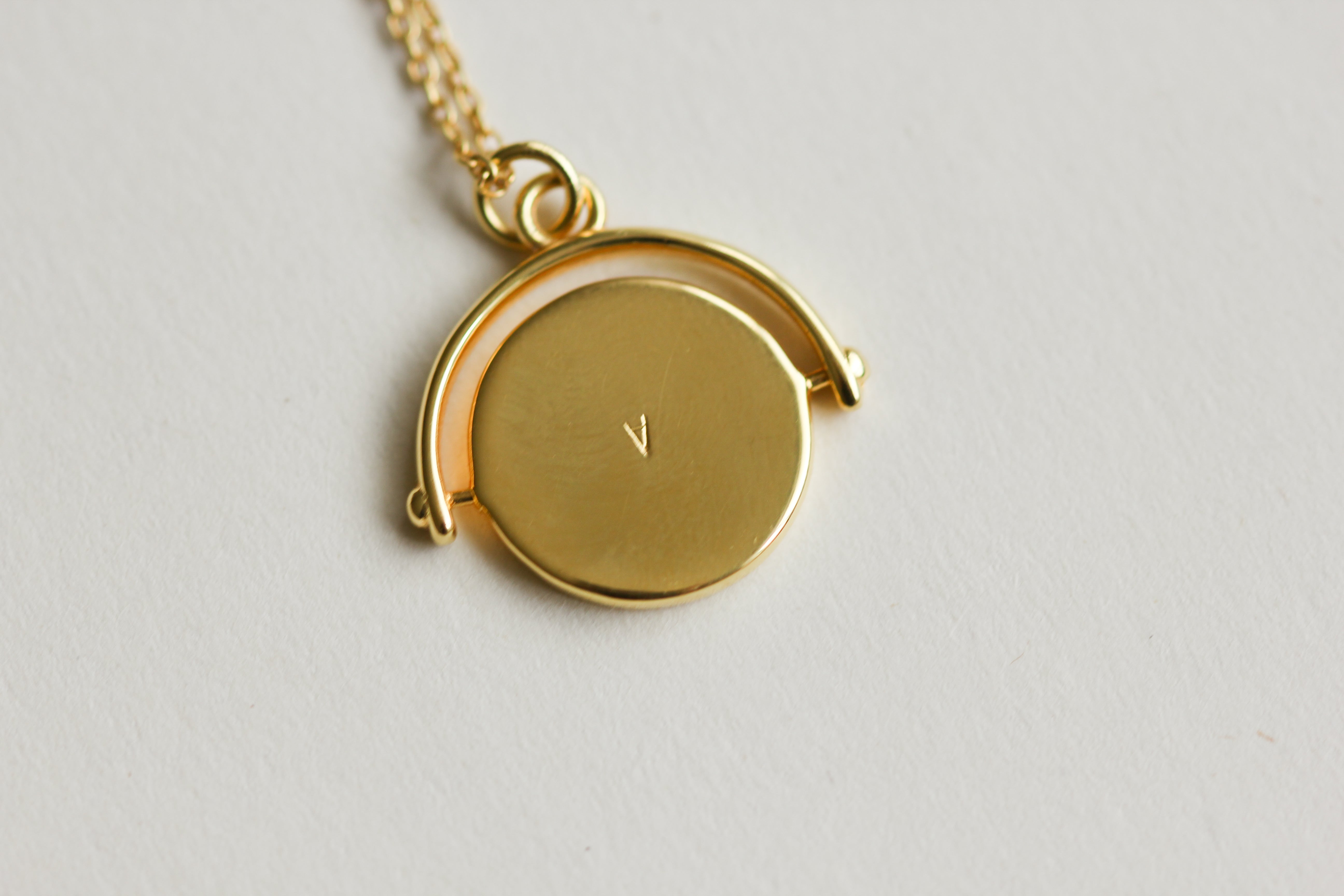 Plus present, gold initial necklace 