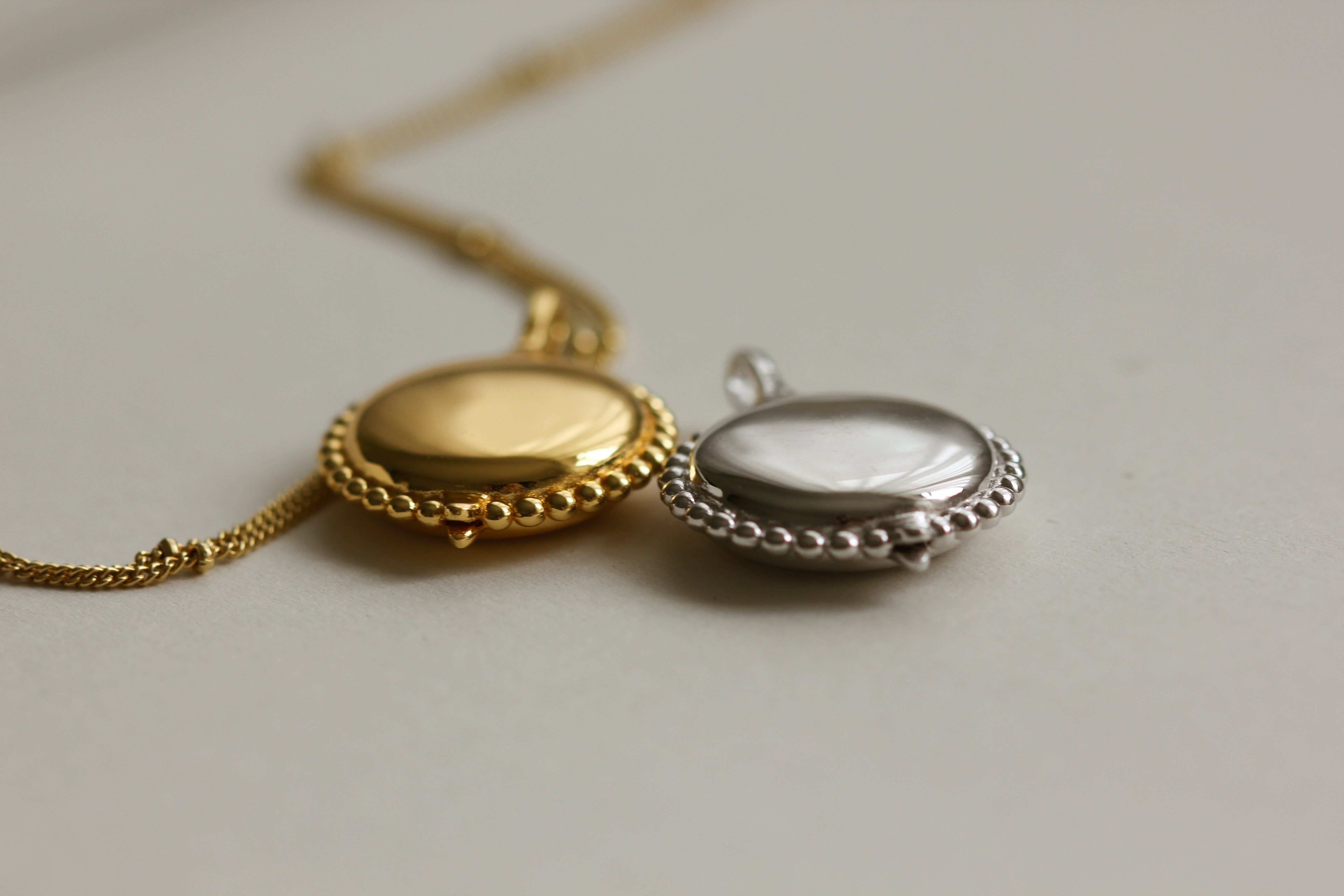 Personalised gold vermeil, sterling silver initial necklace locket Shown with a beaded chain 