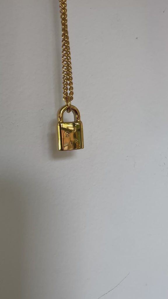 Multiple initial lock necklace 